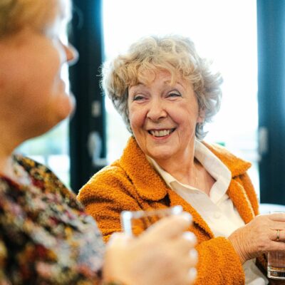 two smiling seniors
